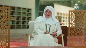 مجموعة طلاب مسلمين يتعلمون في ورشة تعليمية، يعكس تأثير هيفاء يونس.